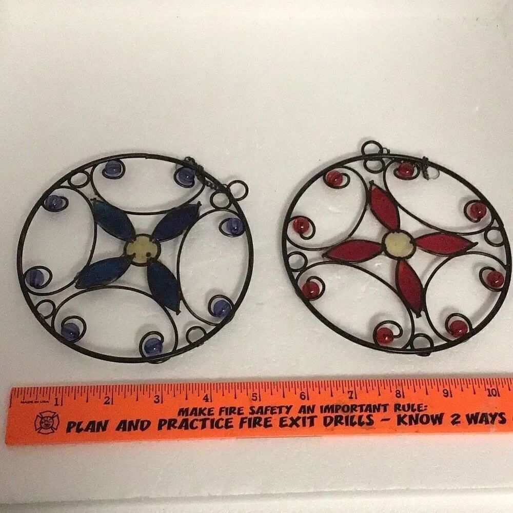 Pair of red and blue stain, glass suncatcher, flower wheels